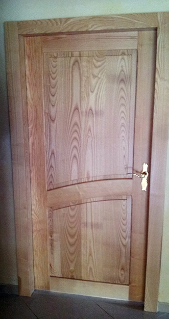 fabricant à arc et senans porte bois massif exterieur